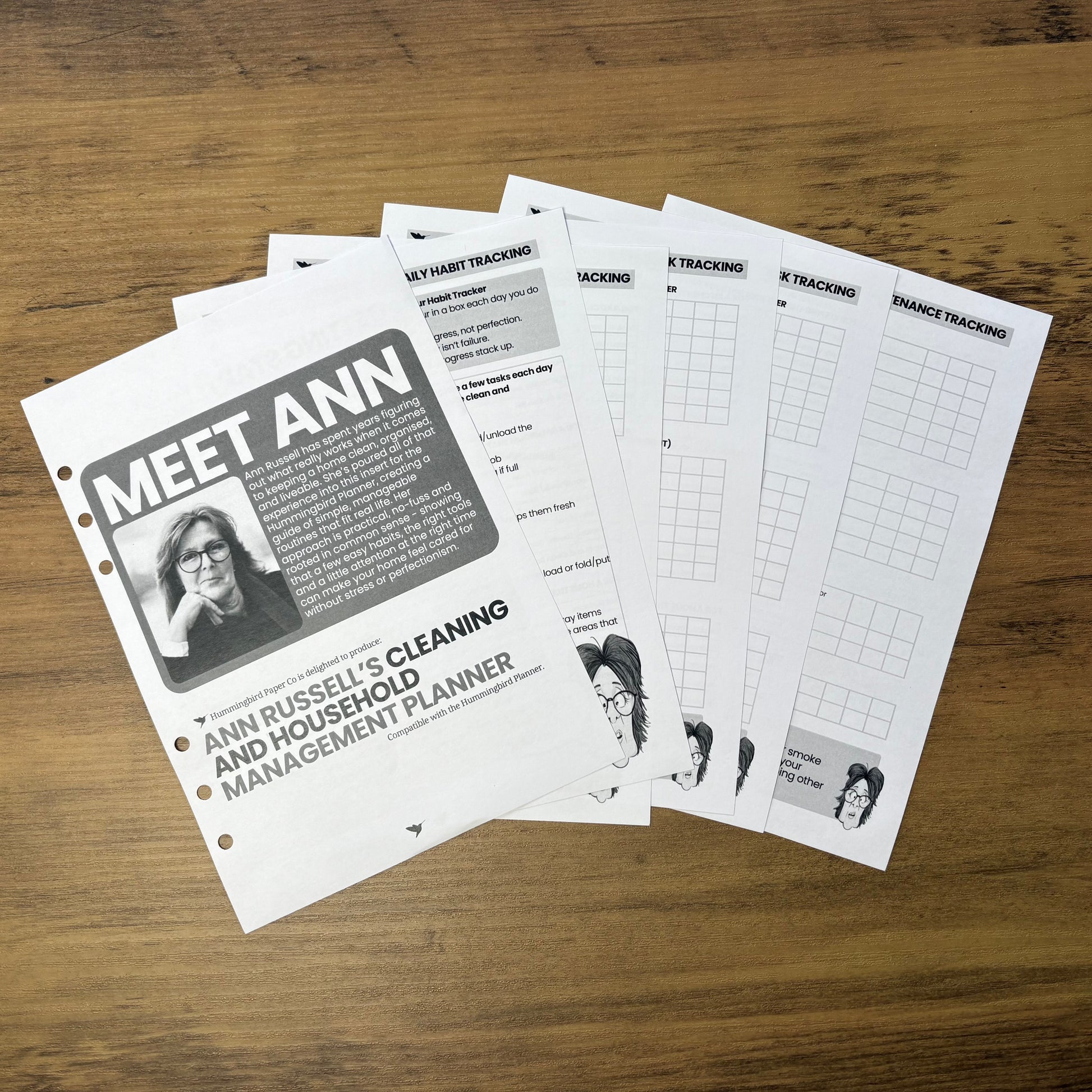 Ann Russell's Cleaning and household management planner on a wooden surface