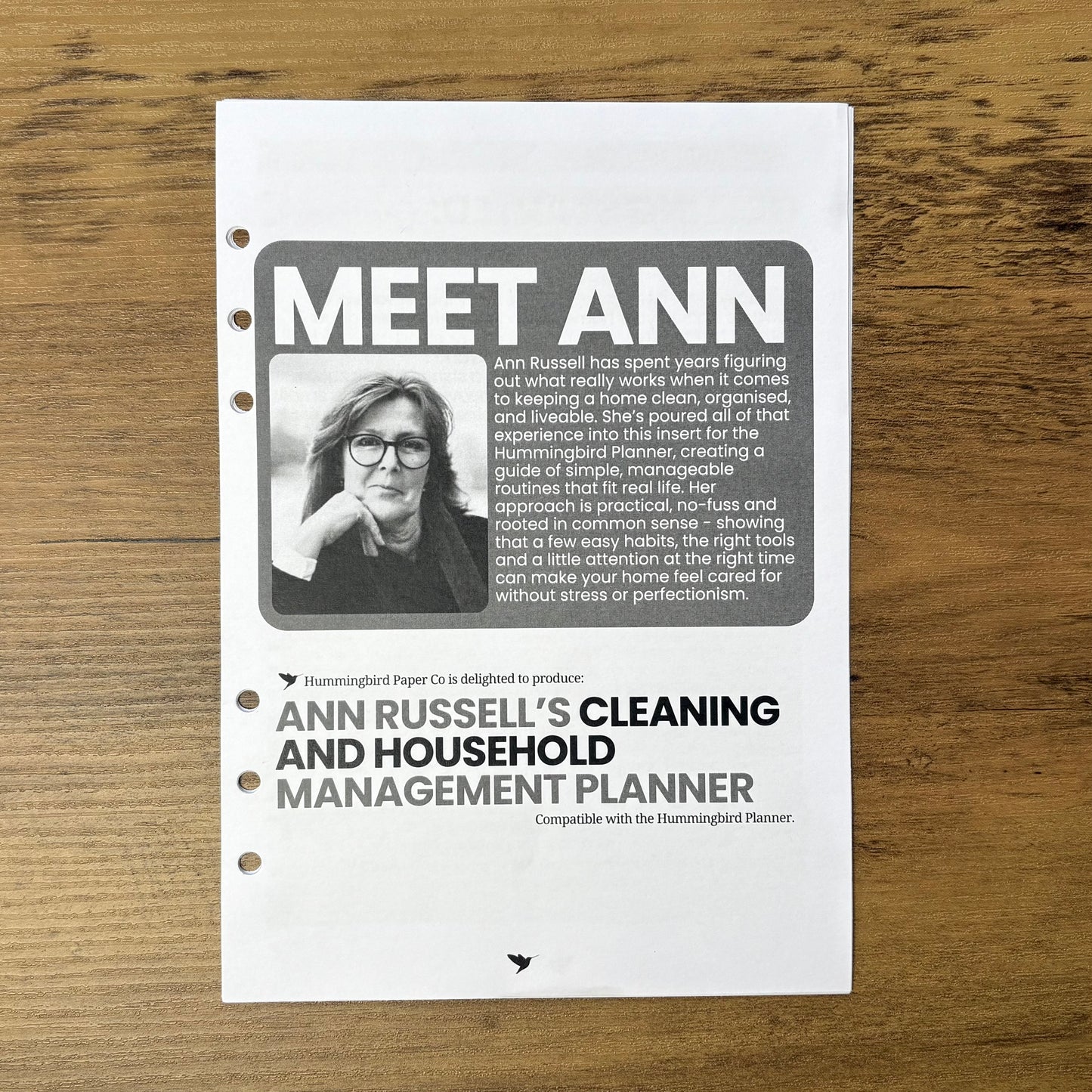 Ann Russell's Cleaning and household management planner on a wooden surface