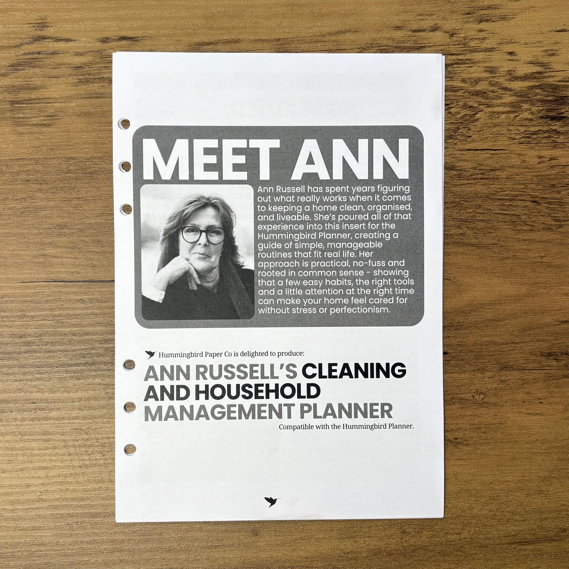 Ann Russell's Cleaning and household management planner on a wooden surface